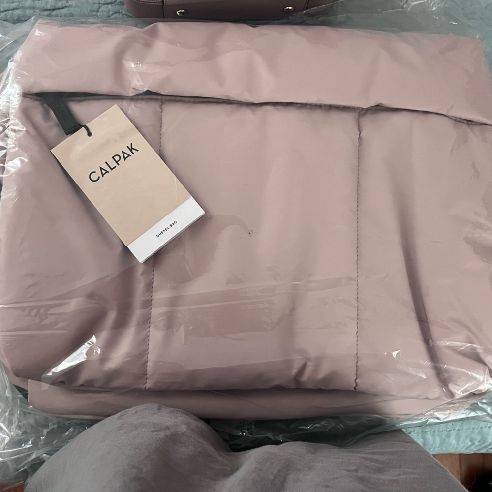 Calpak Luka Duffel Bag in Rose Quartz. Regular Size not the Large.